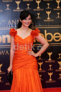 Asmirandah memilih gaun oranye saat hadir di acara tersebut. Kanti/detikHOT.