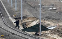 Operator perusahaan kereta Deutsche Bahn menyatakan 50 jadwal perjalanan kereta api menjadi dialihkan selama satu jam gara-gara peristiwa itu. REUTERS/Tobias Schwarz.