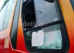 Kaca TransJ Pecah Terkena Lemparan Kunci L