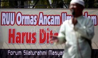 Pendemo memprotes RUU tersebut karena dinilai berpotensi memunculkan asas tunggal Pancasila seperti zaman Orde Baru.