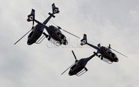 Empat helikopter bermanuver untuk memeriahkan HUT ke-67 TNI AU.