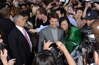 Beruntungnya bisa foto bareng Tom Cruise. Jason Merritt/Getty Images/AFP.