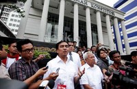 Effendi Simbolon memberikan keterangan pers di depan gedung Mahkamah Konstitusi (MK), Jakarta, Senin (15/4/2014).