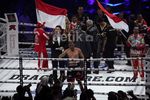 Chris John Pertahankan Gelar