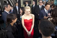 Aktris yang pernah memenangkan penghargaan BAFTA untuk kategori Best Actress in a Leading Role ini tertawa riang. Reuters/Andrew Kelly.
