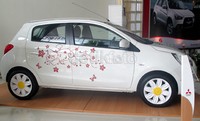 Mirage berkelir putih motif batik dan pelek bunga ini memang sengaja dihadirkan untuk dipajang saat Grand Opening diler Mitsubishi Sun Star Motor.