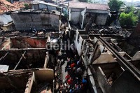 Puluhan rumah tersebut terbakar, Minggu (5/5/2013) kemarin.