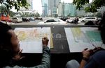 Melukis Tugu Selamat Datang