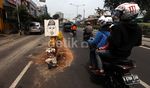 Awas, Jalan Rusak di Dewi Sartika