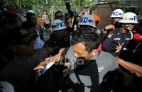 Seorang pedagang sempat diamankan petugas.