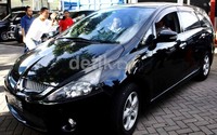 Mobil Mitsubishi Grandis yang disita dari kantor PKS tiba di parkiran gedung KPK. Lamhot Aritonang/detikFoto.
