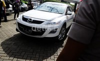 Proses penyitaan ini dikawal oleh sekitar 10 Brimob.