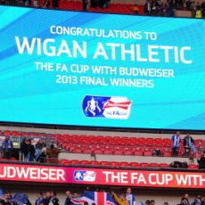 Wigan: Romantisme Ideal yang Belum Selesai