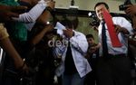Tutupi Wajah, Effendi Kumala Digiring ke Rutan