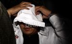 Tutupi Wajah, Effendi Kumala Digiring ke Rutan