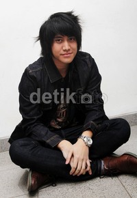 Kevin tersenyum. Gusmun/detikFoto.