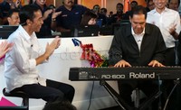 Permainan piano Gita mendapat tepuk tangan dari Jokowi. Mulya Nurbilkis/detikcom.