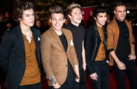 One Direction berhasil mengantongi 3 penghargaan Top New Artist, Top Duo Grup, dan Top Pop Artist. Francois Durand/Getty Images.