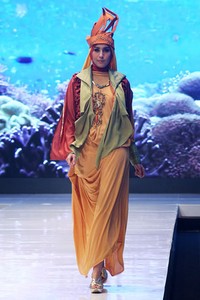Jakarta, Indonesia - 17 Mei. Lia Afif Reeforange Invasion. Moeslim Wear. Jakarta Fashion & Food Festival 2013 at Grand Ballroom Harris Hotel. Kelapa Gading. 17 Mei 2013. Jakarta. [Foto: Mohammad Abduh/Wolipop]