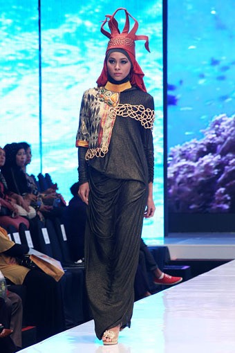 Jakarta, Indonesia - 17 Mei. Lia Afif Reeforange Invasion. Moeslim Wear. Jakarta Fashion & Food Festival 2013 at Grand Ballroom Harris Hotel. Kelapa Gading. 17 Mei 2013. Jakarta. [Foto: Mohammad Abduh/Wolipop]