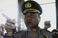 Begitu tiba, Teddy langsung masuk ke lobi gedung KPK. Lamhot Aritonang/detikFoto.