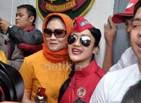 Di bagian belakang bajunya, terpampang tulisan 'I'm Free'. Noel/detikHOT.