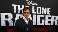 Meskipun sudah membabat rambut gondrongnya, rambut pendek Depp tetap terkesan berantakan. REUTERS/Mario Anzuoni.