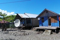 Suasana desa di Pulau Yobeh. Butuh waktu 45 menit untuk mencapainya lewat jalur darat dari Pantai Khalkote, pusat Festival Danau Sentani 2013 berada. Menggunakan perahu, Pulau Yobeh pun bisa dicapai dengan waktu sekitar 1 jam (Madin/detikTravel)