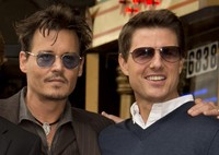 Johnny Depp dan Tom Cruise hadir di Hollywood Walk of Fame. AFP Photo/Robyn Beck.