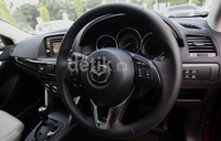 Mazda CX-5 terbaru ini juga sudah mengadopsi sistem i-Stop dimana teknologi ini secara otomatis menyalakan dan mematikan mesin ketika kendaraan sedang tidak bergerak agar dapat memaksimalkan efisiensi bahan bakar.