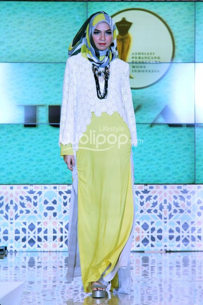 Jakarta - Indonesia. Tuty Adib Ramadhan Runway 2014 at Grand Atrium Kota Kasablanka. 27 Juli 2013. Jakarta. [Foto: Mohammad Abduh/Wolipop]