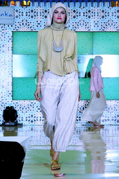 Jakarta - Indonesia. Ria Miranda Ramadhan Runway 2014 at Grand Atrium Kota Kasablanka. 27 Juli 2013. Jakarta. [Foto: Mohammad Abduh/Wolipop]