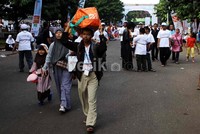 Para pemudik tiba di Parkir Timur Senayan, Jakarta, untuk mengikuti mudik gratis yang diselenggarakan BNI.