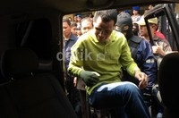 Dikawal ketat tim pemburu preman bersenjata lengkap, Hercules dibawa ke Mapolres Jakarta Barat. Kali ini, dia dijerat dengan pasal pemerasan dan pencucian uang.