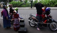 Karena tidak pasti kedatangan Jokowi, warga memilih pulang. Lamhot Aritonang/detikFoto.