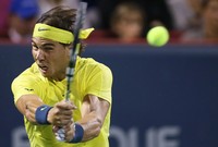 Di babak final, Nadal akan menghadapi jagoan tuan rumah, Milos Raonic. Raonic lebih dulu lolos setelah menyingkirkan Vasek Pospisil dengan skor 6-4, 1-6, 7-6(4). REUTERS/Christinne Muschi.