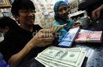 Rupiah Kembali Terpuruk di Rp 10.300 per-Dolar AS