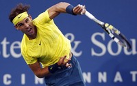     Rafael Nadal dengan mudah mengatasi Benjamin Becker di partai babak kedua Cincinnati Masters 2013. Nadal pun kini tiba di babak ketiga. REUTERS/John Sommers II.