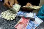 Rupiah Melemah, Dolar Sentuh Rp 10.700