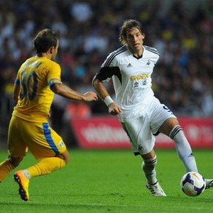 Swansea Raih Kemenangan Telak