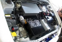 Motor listrik di Hevina. Tenaga listrik ini membuat mobil bisa berlari kencang sampai 140 km per jam dengan jarak jelajah 130 km.