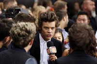 Harry Styles mewakili teman-temannya untuk sesi wawancara. REUTERS/Lucas Jackson.