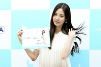 Seohyun mengibaskan rambut panjangnya. TenAsia/Paeng Hyun-joon