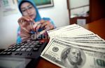 Dolar Sedikit Jinak Terhadap Rupiah