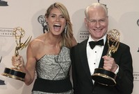 Bersama Tim Gunn, Heidi memenangkan penghargaan Outstanding Host for a Reality or Reality-Competition Program untuk 'Project Runway'. REUTERS/Jonathan Alcorn.