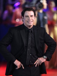 Aktor laga John Travolta juga hadir di acara tersebut. REUTERS/Jason Lee.