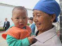 Salah satu wajah anak kecil di perkampungan muslim di Wuzhong, China (Putri/detikTravel)