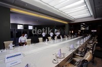 Sejumlah petugas merapihkan meja di salah satu ruangan.