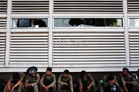 Petugas Satpol PP berjaga di depan halte tersebut. Sementara itu polisi sudah menangkap dua warga yang diduga memprovokatori warga lainnya untuk membakar halte tersebut.
