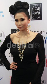 Gaya rambutnya juga terlihat unik. Asep/detikHOT.